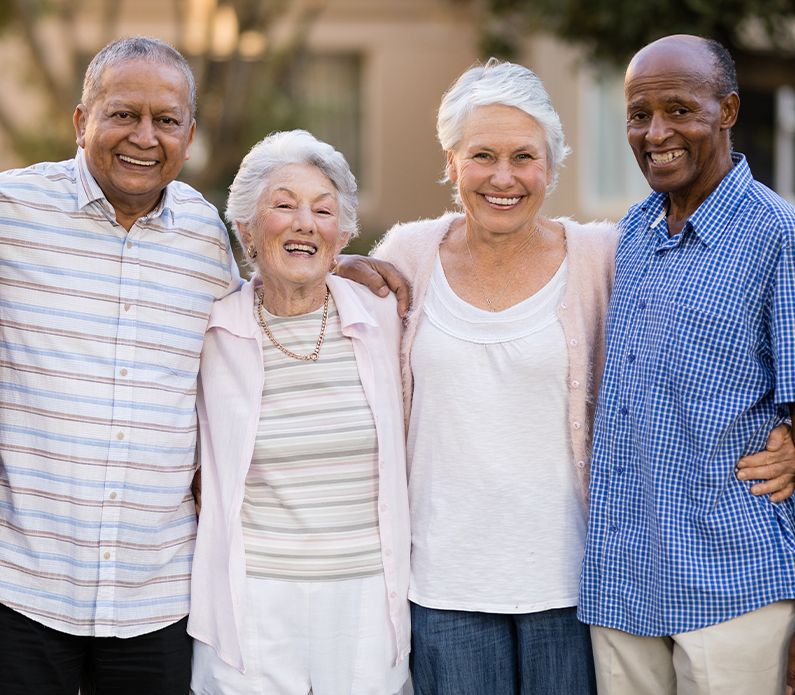 older people smiling for the camera